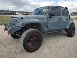 Salvage cars for sale from Copart Houston, TX: 2015 Jeep Wrangler Unlimited Sport