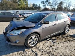 Salvage cars for sale from Copart Hampton, VA: 2012 Ford Focus SEL