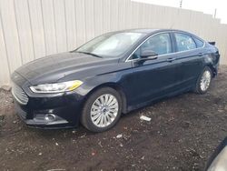 Salvage cars for sale at auction: 2015 Ford Fusion SE Hybrid