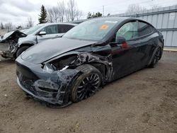 Salvage cars for sale from Copart Ontario Auction, ON: 2022 Tesla Model Y