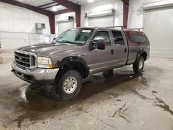 Salvage trucks for sale at Avon, MN auction: 2003 Ford F250 Super Duty