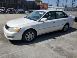 Salvage cars for sale from Copart Wilmington, CA: 2001 Toyota Avalon XL