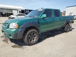 Salvage cars for sale from Copart Fresno, CA: 2003 Nissan Frontier Crew Cab XE