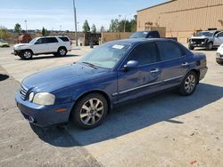 KIA Optima LX salvage cars for sale: 2005 KIA Optima LX