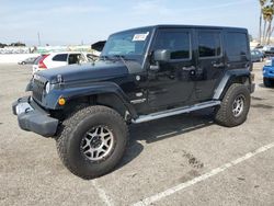 Salvage cars for sale from Copart Van Nuys, CA: 2011 Jeep Wrangler Unlimited Jeep 70TH Anniversary