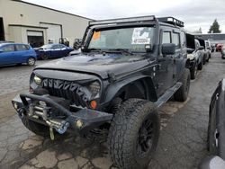 Salvage cars for sale from Copart Woodburn, OR: 2012 Jeep Wrangler Unlimited Sport