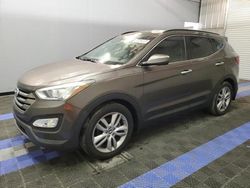 Salvage cars for sale from Copart Orlando, FL: 2014 Hyundai Santa FE Sport