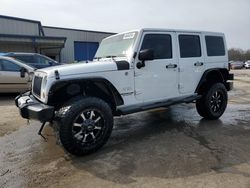 Salvage cars for sale from Copart Ellwood City, PA: 2011 Jeep Wrangler Unlimited Sahara