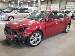 Salvage cars for sale from Copart Blaine, MN: 2011 Chevrolet Cruze LTZ