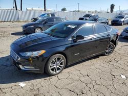 Salvage cars for sale at Van Nuys, CA auction: 2017 Ford Fusion SE Hybrid
