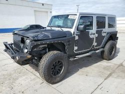 Salvage cars for sale from Copart Farr West, UT: 2011 Jeep Wrangler Unlimited Sahara