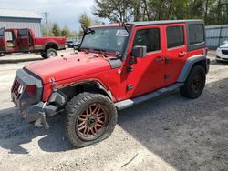 Salvage cars for sale from Copart Midway, FL: 2011 Jeep Wrangler Unlimited Sport