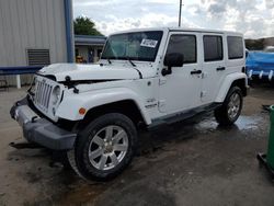 Salvage cars for sale from Copart Orlando, FL: 2016 Jeep Wrangler Unlimited Sahara