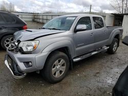 Salvage cars for sale from Copart Arlington, WA: 2014 Toyota Tacoma Double Cab Long BED