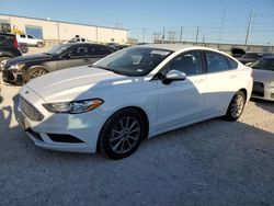 Salvage cars for sale from Copart Haslet, TX: 2017 Ford Fusion SE