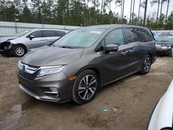 Honda Odyssey salvage cars for sale: 2018 Honda Odyssey Elite