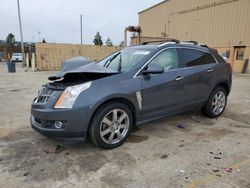 Salvage cars for sale from Copart Gaston, SC: 2011 Cadillac SRX Performance Collection