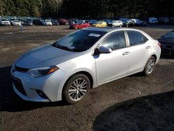Salvage cars for sale from Copart Graham, WA: 2015 Toyota Corolla L