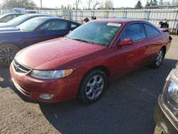 Salvage cars for sale from Copart Woodburn, OR: 2000 Toyota Camry Solara SE