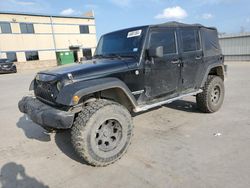 Salvage cars for sale from Copart Wilmer, TX: 2012 Jeep Wrangler Unlimited Sport