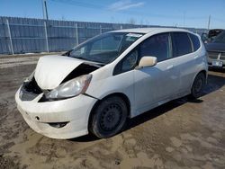 Salvage cars for sale from Copart Nisku, AB: 2011 Honda FIT Sport