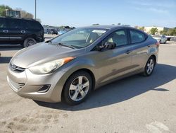 Vehiculos salvage en venta de Copart Orlando, FL: 2013 Hyundai Elantra GLS