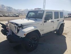 Salvage cars for sale from Copart Farr West, UT: 2013 Jeep Wrangler Unlimited Sahara
