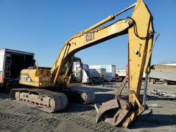 Salvage trucks for sale at Cahokia Heights, IL auction: 1994 Caterpillar 320L