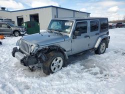 Salvage cars for sale at Central Square, NY auction: 2014 Jeep Wrangler Unlimited Sahara