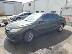 Salvage cars for sale at Vallejo, CA auction: 2011 Toyota Camry Hybrid