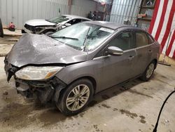 Salvage cars for sale from Copart West Mifflin, PA: 2012 Ford Focus SEL