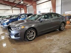 Salvage cars for sale at Lansing, MI auction: 2019 Ford Fusion SEL