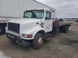 Salvage trucks for sale at Woodhaven, MI auction: 2000 International 4700 Rollback Truck