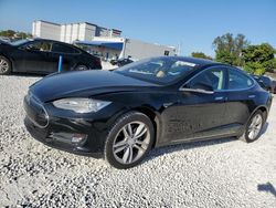 Salvage cars for sale at Opa Locka, FL auction: 2012 Tesla Model S