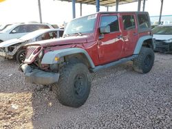 Salvage cars for sale at Phoenix, AZ auction: 2012 Jeep Wrangler Unlimited Sport