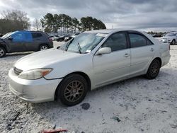 2004 Toyota Camry LE en venta en Loganville, GA