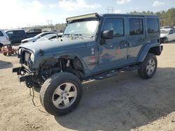 Salvage cars for sale at Greenwell Springs, LA auction: 2014 Jeep Wrangler Unlimited Sahara