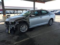 Carros salvage sin ofertas aún a la venta en subasta: 2014 Toyota Camry L