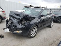 Salvage cars for sale at Magna, UT auction: 2014 Ford Escape Titanium