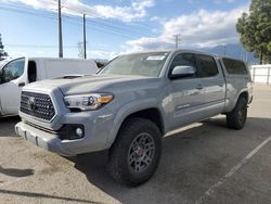 Salvage cars for sale from Copart Rancho Cucamonga, CA: 2018 Toyota Tacoma Double Cab