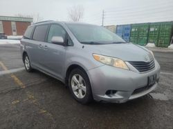 Salvage cars for sale from Copart Ottawa, ON: 2011 Toyota Sienna LE