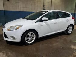 Salvage cars for sale at Woodhaven, MI auction: 2012 Ford Focus SEL