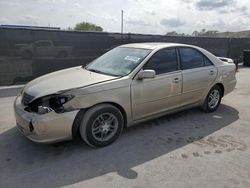 Salvage cars for sale at Orlando, FL auction: 2003 Toyota Camry LE