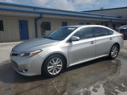 Carros salvage sin ofertas aún a la venta en subasta: 2013 Toyota Avalon Base