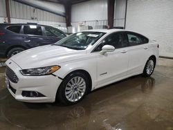 Salvage cars for sale at West Mifflin, PA auction: 2013 Ford Fusion SE Hybrid