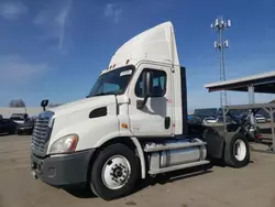 Salvage trucks for sale at Hayward, CA auction: 2013 Freightliner Cascadia Semi Truck