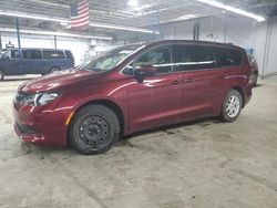 Salvage cars for sale at Wheeling, IL auction: 2022 Chrysler Voyager LX