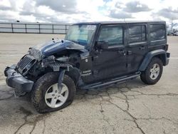 Salvage cars for sale at Fresno, CA auction: 2016 Jeep Wrangler Unlimited Sport