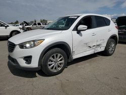 Salvage cars for sale from Copart Bakersfield, CA: 2016 Mazda CX-5 Touring