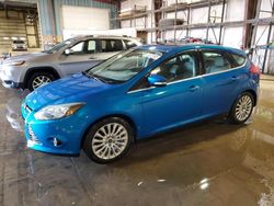 Salvage cars for sale at Eldridge, IA auction: 2012 Ford Focus Titanium